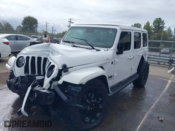 ✅ 2021 Jeep Wrangler Unlimited Sahara • VIN: 1C4HJXEG1MW597127 • Lot: 43354032. Listed on IAAI with 82,436 mi. Free auction sales archive from the USA and detailed vehicle history report at DreamBid. Image 2.