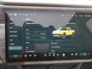 ✅ 2022 Rivian R1T Launch Edition • VIN: 7FCTGAAL2NN011755 • Lot: 59934185. Wystawiony na Copart z przebiegiem 12 261 mil. Bezpłatny archiwum sprzedaży aukcyjnych z USA i szczegółowy raport historii pojazdu na DreamBid. Zdjęcie 9.