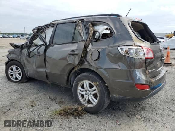 2012 Hyundai Santa Fe GLS с VIN 5XYZG3AB7CG145877, выставлен на аукционе Copart как лот 71986394 с пробегом Не указан миль и На запчасти • Non repairable. История ставок и продаж доступна на DreamBid. Изображение 2.