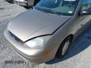 ✅ 2003 Ford Focus LX • VIN: 1FAFP33P63W324786 • Lot: 42693187. Wystawiony na IAAI z przebiegiem 128 597 mil. Bezpłatny archiwum sprzedaży aukcyjnych z USA i szczegółowy raport historii pojazdu na DreamBid. Zdjęcie 19.