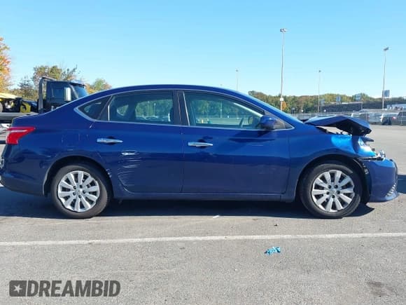 ✅ 2019 Nissan Sentra S • VIN: 3N1AB7AP0KY304170 • Lot: 43384524. Listed on IAAI with 140,776 mi. Free auction sales archive from the USA and detailed vehicle history report at DreamBid. Image 13.