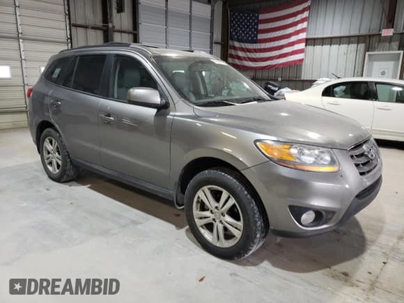 ✅ 2011 Hyundai Santa Fe SE • VIN: 5XYZH4AG0BG030440 • Lot: 83838424. Listed on Copart with 229,974 mi. Free auction sales archive from the USA and detailed vehicle history report at DreamBid. Image 4.