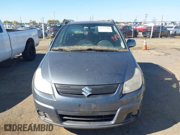 ✅ 2009 Suzuki SX4 Touring AWD • VIN: JS2YB417895101955 • Лот: 43474185. Опубликован ранее на IAAI с пробегом 185 997 миль. Бесплатный доступ к архиву аукционных продаж из США и подробный отчёт об истории автомобиля на DreamBid. Изображение 6.