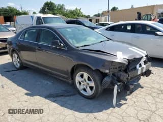 ✅ 2011 Chevrolet Malibu 1LS • VIN: 1G1ZB5E13BF301242 • Lot: 54643004. Listed on Copart with 172,927 mi. Free auction sales archive from the USA and detailed vehicle history report at DreamBid. Image 4.