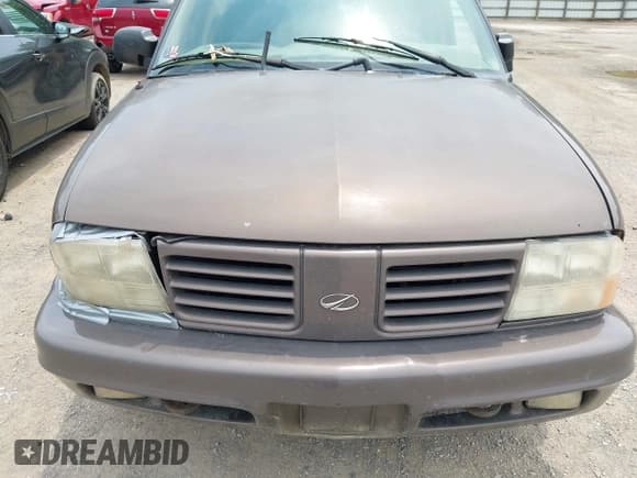 ✅ 1999 Oldsmobile Bravada • VIN: 1GHDT13W3X2710047 • Lot: 42481978. Wystawiony na IAAI z przebiegiem Nie podano. Bezpłatny archiwum sprzedaży aukcyjnych z USA i szczegółowy raport historii pojazdu na DreamBid. Zdjęcie 10.