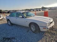 ✅ 2001 Jaguar XJ • VIN: SAJDA14C01LF28568 • Лот: 94040175. Опубликован ранее на Copart с пробегом 144 146 миль. Бесплатный доступ к архиву аукционных продаж из США и подробный отчёт об истории автомобиля на DreamBid. Изображение 4.