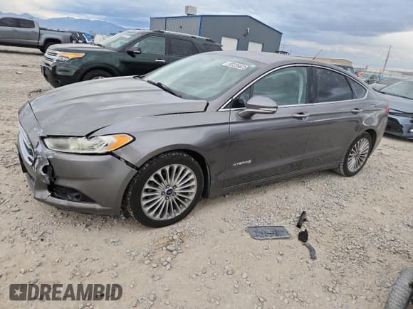 ✅ 2014 Ford Fusion Titanium Hybrid • VIN: 3FA6P0RU5ER398119 • Lot: 92226625. Wystawiony na Copart z przebiegiem 208 179 mil. Bezpłatny archiwum sprzedaży aukcyjnych z USA i szczegółowy raport historii pojazdu na DreamBid. Zdjęcie 1.