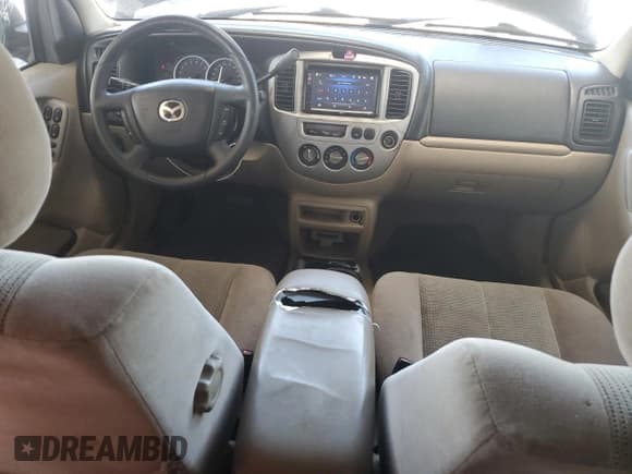 ✅ 2004 Mazda Tribute LX • VIN: 4F2CZ04144KM15547 • Lot: 63337835. Listed on Copart with 246,017 mi. Free auction sales archive from the USA and detailed vehicle history report at DreamBid. Image 8.