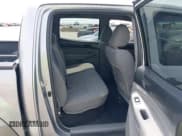 ✅ 2014 Toyota Tacoma PreRunner • VIN: 3TMJU4GN1EM173354 • Lot: 42021686. Listed on IAAI with 101,138 mi. Free auction sales archive from the USA and detailed vehicle history report at DreamBid. Image 8.