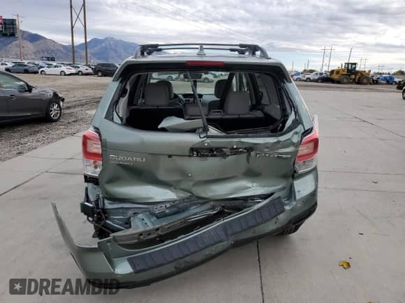 2018 Subaru Forester Limited with VIN JF2SJARC8JH586461, listed as a Copart auction lot 86336885 with 65,237 mi miles and Salvage title. Bid and sale history available at DreamBid. Image 6.