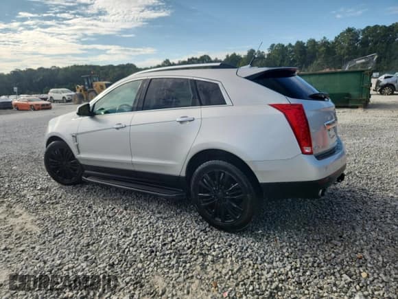 ✅ 2012 Cadillac SRX Performance Collection • VIN: 3GYFNBE36CS582753 • Lot: 70907965. Listed on Copart with 85,563 mi. Free auction sales archive from the USA and detailed vehicle history report at DreamBid. Image 2.