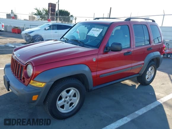 ✅ 2006 Jeep Liberty Sport • VIN: 1J4GL48K96W119314 • Lot: 43651897. Listed on IAAI with 124,705 mi. Free auction sales archive from the USA and detailed vehicle history report at DreamBid. Image 2.