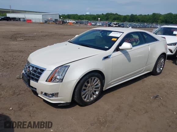 ✅ 2014 Cadillac CTS Performance • VIN: 1G6DG1E36E0124371 • Lot: 42535079. Listed on IAAI with 51,351 mi. Free auction sales archive from the USA and detailed vehicle history report at DreamBid. Image 2.