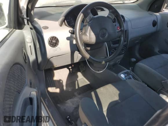 2005 Chevrolet Aveo LS с VIN KL1TD526X5B339609, выставлен на аукционе Copart как лот 77473134 с пробегом 250 357 миль миль и Списание • Salvage title. История ставок и продаж доступна на DreamBid. Изображение 8.