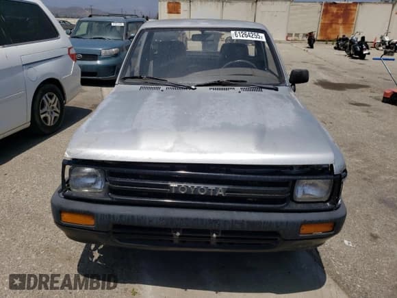 ✅ 1989 Toyota Pickup DX • VIN: JT4RN81P0K0034316 • Лот: 61264255. Опубликован ранее на Copart с пробегом 223 865 миль. Бесплатный доступ к архиву аукционных продаж из США и подробный отчёт об истории автомобиля на DreamBid. Изображение 5.