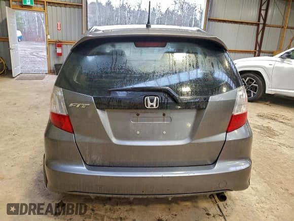 ✅ 2013 Honda Fit • VIN: LUCGE8G58D3008282 • Лот: 93811915. Опубликован ранее на Copart с пробегом Не указан. Бесплатный доступ к архиву аукционных продаж из США и подробный отчёт об истории автомобиля на DreamBid. Изображение 6.