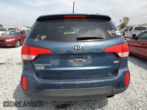 ✅ 2014 Kia Sorento LX • VIN: 5XYKTDA66EG497020 • Лот: 50225855. Опубликован ранее на Copart с пробегом 141 065 миль. Бесплатный доступ к архиву аукционных продаж из США и подробный отчёт об истории автомобиля на DreamBid. Изображение 6.