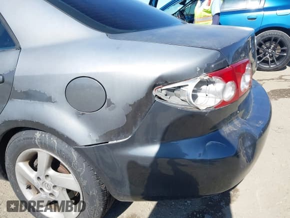 ✅ 2003 Mazda 6 i • VIN: 1YVFP80C435M03639 • Лот: 42643473. Опубликован ранее на IAAI с пробегом 53 150 миль. Бесплатный доступ к архиву аукционных продаж из США и подробный отчёт об истории автомобиля на DreamBid. Изображение 6.