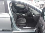 ✅ 2014 Ford Fusion Titanium Hybrid • VIN: 3FA6P0RU8ER350016 • Lot: 43532622. Listed on IAAI with 87,458 mi. Free auction sales archive from the USA and detailed vehicle history report at DreamBid. Image 5.