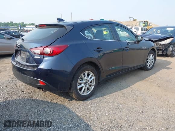 ✅ 2015 Mazda 3 i Grand Touring • VIN: JM1BM1M74F1241864 • Lot: 42447035. Wystawiony na IAAI z przebiegiem 73 825 mil. Bezpłatny archiwum sprzedaży aukcyjnych z USA i szczegółowy raport historii pojazdu na DreamBid. Zdjęcie 4.