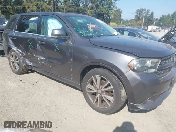 2013 Dodge Durango R/T with VIN 1C4SDHCT3DC687528, listed as a IAAI auction lot 43303576 with 94,220 mi miles and . Bid and sale history available at DreamBid. Image 1.