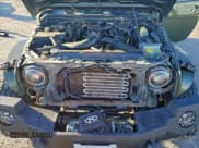 ✅ 2008 Jeep Wrangler Unlimited Sahara • VIN: 1J8GA59148L553239 • Lot: 94098485. Listed on Copart with 136,730 mi. Free auction sales archive from the USA and detailed vehicle history report at DreamBid. Image 12.