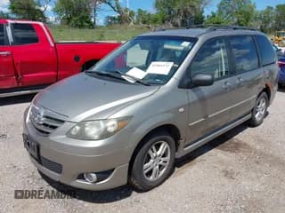 ✅ 2006 Mazda MPV LX • VIN: JM3LW28A360558638 • Lot: 42481272. Listed on IAAI with 101,279 mi. Free auction sales archive from the USA and detailed vehicle history report at DreamBid. Image 2.