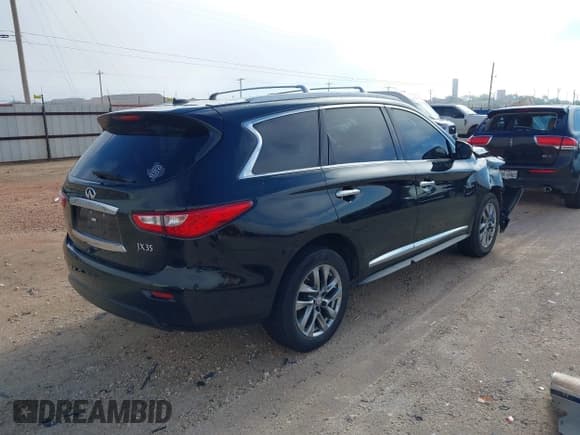 ✅ 2013 Infiniti JX35 • VIN: 5N1AL0MM7DC332915 • Lot: 43520543. Listed on IAAI with 100,103 mi. Free auction sales archive from the USA and detailed vehicle history report at DreamBid. Image 4.