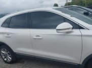 ✅ 2016 Lincoln MKC Select • VIN: 5LMCJ2D96GUJ18127 • Lot: 43033059. Listed on IAAI with 120,174 mi. Free auction sales archive from the USA and detailed vehicle history report at DreamBid. Image 13.