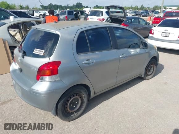 ✅ 2009 Toyota Yaris • VIN: JTDKT903295241136 • Lot: 42692775. Listed on IAAI with 118,788 mi. Free auction sales archive from the USA and detailed vehicle history report at DreamBid. Image 4.