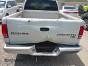 ✅ 2003 Dodge Dakota SLT • VIN: 1D7HL48X63S144573 • Lot: 42798150. Wystawiony na IAAI z przebiegiem 224 361 mil. Bezpłatny archiwum sprzedaży aukcyjnych z USA i szczegółowy raport historii pojazdu na DreamBid. Zdjęcie 6.