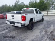 ✅ 2018 Chevrolet Silverado 1500 LT • VIN: 3GCUKREH0JG102278 • Lot: 43499476. Listed on IAAI with 121,159 mi. Free auction sales archive from the USA and detailed vehicle history report at DreamBid. Image 4.