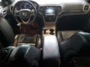 ✅ 2015 Jeep Grand Cherokee Overland • VIN: 1C4RJFCGXFC877599 • Lot: 82388315. Wystawiony na Copart z przebiegiem 97 250 mil. Bezpłatny archiwum sprzedaży aukcyjnych z USA i szczegółowy raport historii pojazdu na DreamBid. Zdjęcie 8.