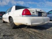 ✅ 2005 Ford Crown Victoria Standard • VIN: 2FAFP73W05X154611 • Lot: 42234491. Listed on IAAI with 274,393 mi. Free auction sales archive from the USA and detailed vehicle history report at DreamBid. Image 6.