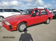 ✅ 1987 Alfa Romeo Milano • VIN: ZARDA1160H1051386 • Лот: 75195914. Опубликован ранее на Copart с пробегом 88 230 миль. Бесплатный доступ к архиву аукционных продаж из США и подробный отчёт об истории автомобиля на DreamBid. Изображение 1.