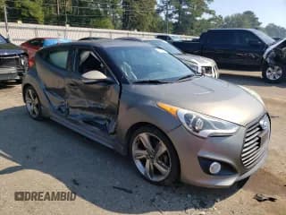 ✅ 2015 Hyundai Veloster Turbo • VIN: KMHTC6AE1FU229902 • Lot: 75295704. Wystawiony na Copart z przebiegiem 133 796 mil. Bezpłatny archiwum sprzedaży aukcyjnych z USA i szczegółowy raport historii pojazdu na DreamBid. Zdjęcie 4.