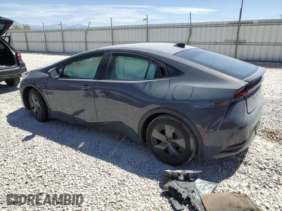 2025 Toyota Prius LE z VIN JTDACAAU1S3062446, wystawiony jako Copart lot #66959305 z przebiegiem Nie podano mil oraz Szkoda całkowita • Salvage title. Historia ofert i sprzedaży dostępna na DreamBid. Obrazek 2.
