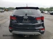 ✅ 2018 Hyundai Santa Fe 2.4L • VIN: 5XYZTDLB9JG569962 • Лот: 66455414. Опубликован ранее на Copart с пробегом 100 231 миль. Бесплатный доступ к архиву аукционных продаж из США и подробный отчёт об истории автомобиля на DreamBid. Изображение 6.