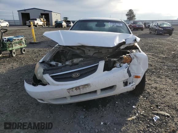 ✅ 2002 Kia Spectra GS • VIN: KNAFB161025073897 • Lot: 77258114. Listed on Copart with 178,290 mi. Free auction sales archive from the USA and detailed vehicle history report at DreamBid. Image 5.