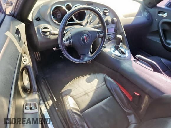 ✅ 2009 Pontiac Solstice GXP • VIN: 1G2MT35X89Y107333 • Лот: 71860315. Опубликован ранее на Copart с пробегом 58 532 миль. Бесплатный доступ к архиву аукционных продаж из США и подробный отчёт об истории автомобиля на DreamBid. Изображение 8.