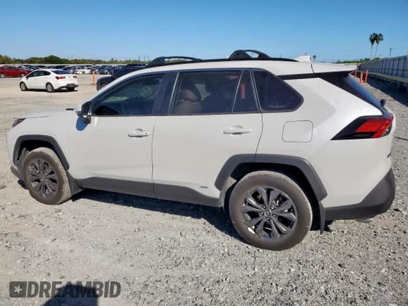 ✅ 2024 Toyota RAV4 Hybrid XLE Premium • VIN: JTMB6RFV6RD117473 • Lot: 91904415. Listed on Copart with 26,374 mi. Free auction sales archive from the USA and detailed vehicle history report at DreamBid. Image 2.