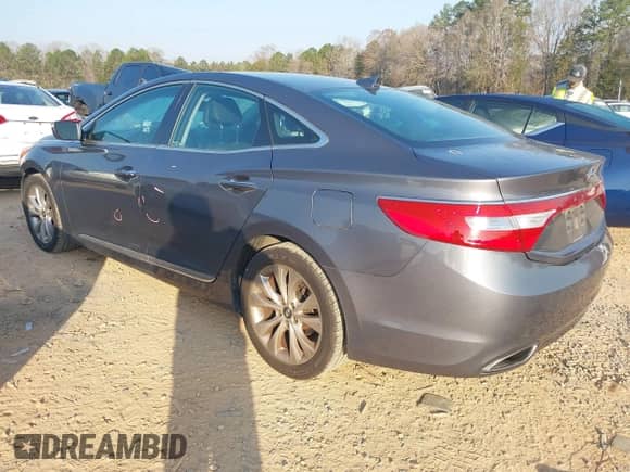 2013 Hyundai Azera z VIN KMHFG4JG6DA243655, wystawiony jako IAAI lot #41802097 z przebiegiem 135 677 mil mil oraz . Historia ofert i sprzedaży dostępna na DreamBid. Obrazek 3.