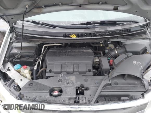 ✅ 2012 Honda Odyssey EX-L • VIN: 5FNRL5H61CB030022 • Lot: 43730404. Listed on IAAI with 153,349 mi. Free auction sales archive from the USA and detailed vehicle history report at DreamBid. Image 10.