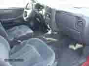 1999 Chevrolet Blazer LT z VIN 1GNDT13WXX2177269, wystawiony jako IAAI lot #42095422 z przebiegiem 210 049 mil mil oraz . Historia ofert i sprzedaży dostępna na DreamBid. Obrazek 5.