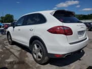 ✅ 2014 Porsche Cayenne • VIN: WP1AA2A27ELA97215 • Lot: 56784685. Listed on Copart with 154,813 mi. Free auction sales archive from the USA and detailed vehicle history report at DreamBid. Image 2.