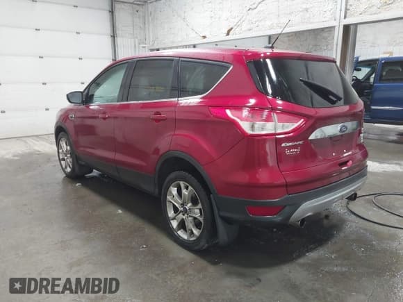✅ 2013 Ford Escape SEL • VIN: 1FMCU9HX5DUC06738 • Lot: 42404536. Listed on IAAI with 140,615 mi. Free auction sales archive from the USA and detailed vehicle history report at DreamBid. Image 3.