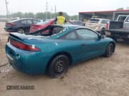 ✅ 1998 Mitsubishi Eclipse RS • VIN: 4A3AK34Y7WE045445 • Lot: 41910552. Wystawiony na IAAI z przebiegiem 126 859 mil. Bezpłatny archiwum sprzedaży aukcyjnych z USA i szczegółowy raport historii pojazdu na DreamBid. Zdjęcie 4.