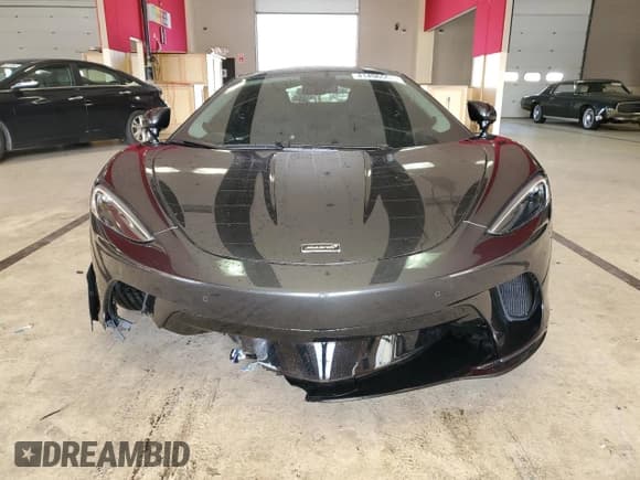 ✅ 2023 McLaren GT • VIN: SBM22GCAXPW002692 • Lot: 41496504. Wystawiony na Copart z przebiegiem Nie podano. Bezpłatny archiwum sprzedaży aukcyjnych z USA i szczegółowy raport historii pojazdu na DreamBid. Zdjęcie 5.
