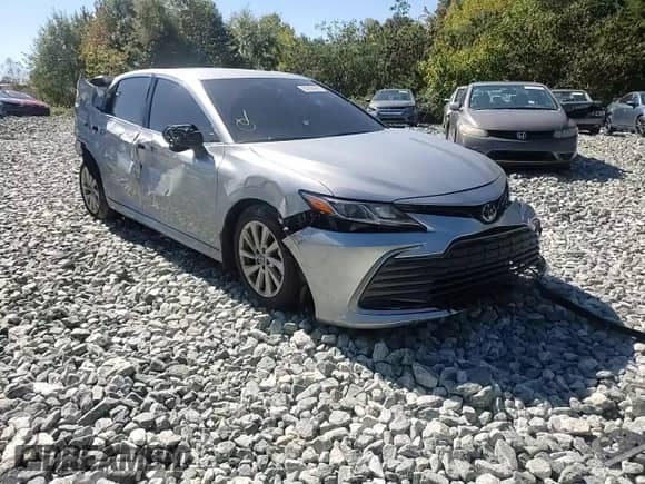2023 Toyota Camry LE with VIN 4T1C11AK1PU121943, listed as a Copart auction lot 82264925 with 56,723 mi miles and Salvage title. Bid and sale history available at DreamBid. Image 13.