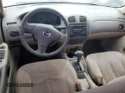 ✅ 2002 Mazda Protege DX • VIN: JM1BJ225921610910 • Lot: 74449784. Wystawiony na Copart z przebiegiem Nie podano. Bezpłatny archiwum sprzedaży aukcyjnych z USA i szczegółowy raport historii pojazdu na DreamBid. Zdjęcie 8.